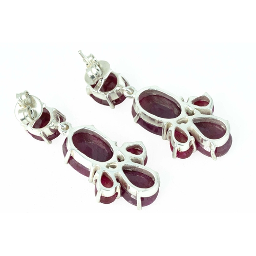 103 - Oval Shaped Faceted Corundum/Ruby Silver Earring 

Wide with push back locks
15grams total weight 
3... 