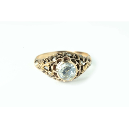 76 - Rose-Cut Rose Gold Ottoman Diamond Ring   

Rose-cut diamond as central stone, intricate openwork 5.... 