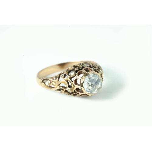 76 - Rose-Cut Rose Gold Ottoman Diamond Ring   

Rose-cut diamond as central stone, intricate openwork 5.... 