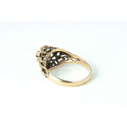 76 - Rose-Cut Rose Gold Ottoman Diamond Ring   

Rose-cut diamond as central stone, intricate openwork 5.... 