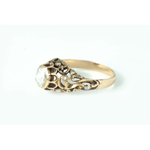 76 - Rose-Cut Rose Gold Ottoman Diamond Ring   

Rose-cut diamond as central stone, intricate openwork 5.... 