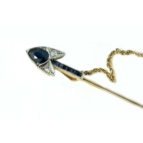 128 - A Gold And Platinum Lapel/Hat Pin

A Gold and Platinum, Sapphire And Diamond Arrow Lapel/Hat Pin, 8.... 