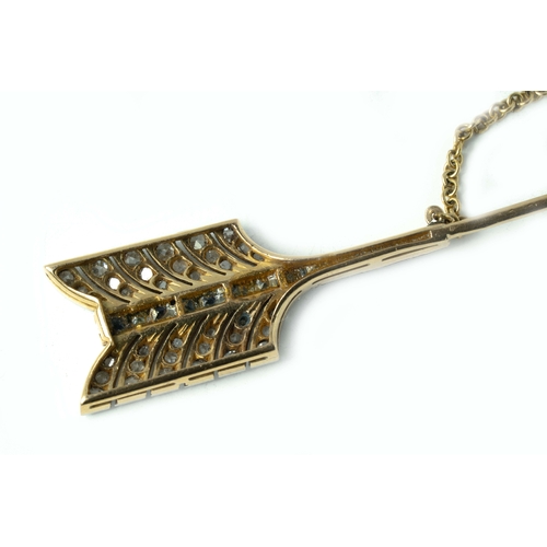 128 - A Gold And Platinum Lapel/Hat Pin

A Gold and Platinum, Sapphire And Diamond Arrow Lapel/Hat Pin, 8.... 