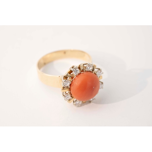 13 - Coral and Diamond Ring    

14ct A coral and diamond ring, featuring a cabochon coral stone, set wit... 