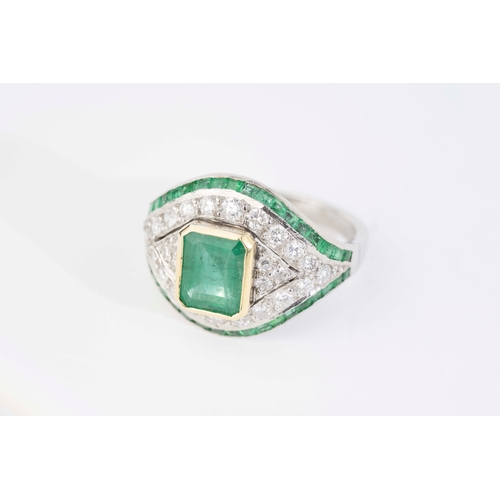 15 - Platinum Diamond and Emerald Ring

Platinum diamond and emerald ring, featuring a captivating square... 