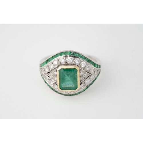 15 - Platinum Diamond and Emerald Ring

Platinum diamond and emerald ring, featuring a captivating square... 