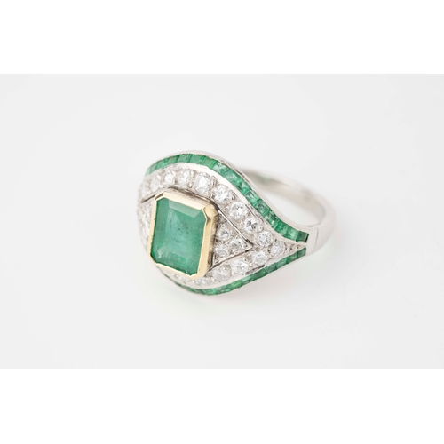 15 - Platinum Diamond and Emerald Ring

Platinum diamond and emerald ring, featuring a captivating square... 