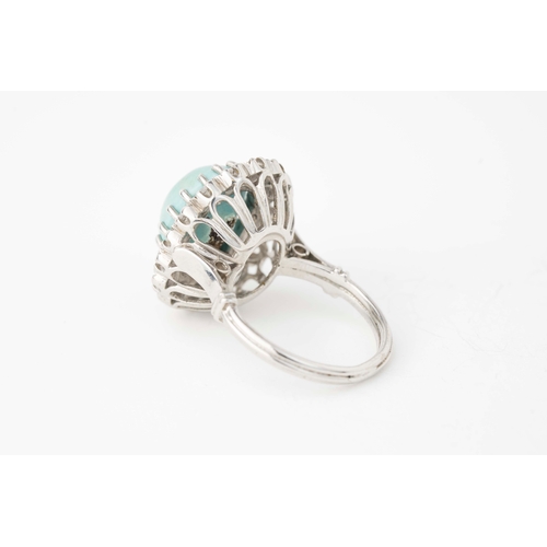 22 - Turquoise and Diamond Ring   

A Turquoise and Diamond ring, with a vibrant oval-shaped turquoise ca... 