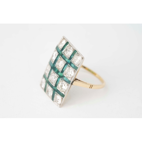 28 - Diamond and Cold Green Enamel White Gold Ring   

A white gold ring with an array of diamonds surrou... 