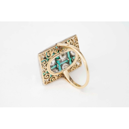 28 - Diamond and Cold Green Enamel White Gold Ring   

A white gold ring with an array of diamonds surrou... 