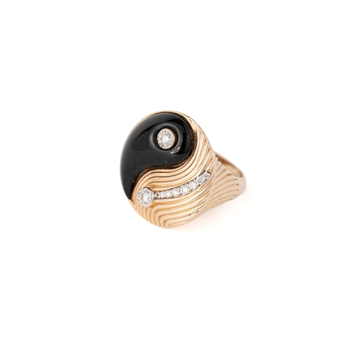 32 - Rose Gold 0.1ct diamond and Black Onxy Ying Yang ring   

A rose gold Ying Yang ring, two round diam... 