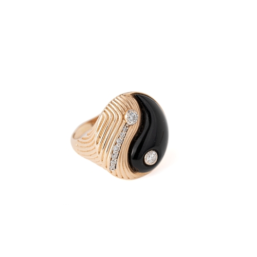 32 - Rose Gold 0.1ct diamond and Black Onxy Ying Yang ring   

A rose gold Ying Yang ring, two round diam... 