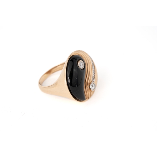 32 - Rose Gold 0.1ct diamond and Black Onxy Ying Yang ring   

A rose gold Ying Yang ring, two round diam... 