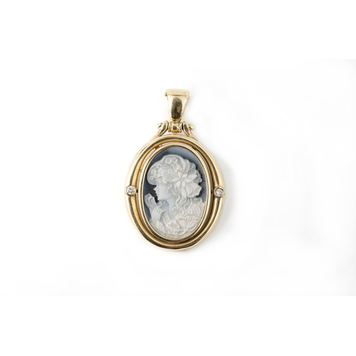 35 - Cameo Pendant With Diamonds   

A porcelain cameo pendant, the oval signet style pendant with centra... 