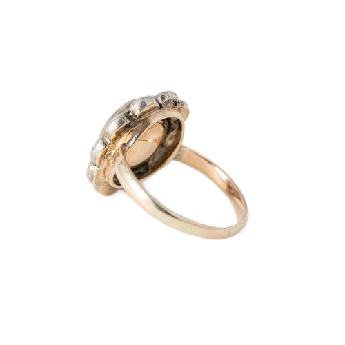 36 - Gold, 1.20ct diamond and Silver Ring

A gold and diamond ring, with a pear-shaped rose-cut diamond, ... 