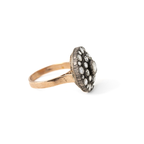 39 - Gold and Old Cut Diamond Ottoman Ring   

Of circular form, surrounded by small round diamonds, 1.60... 