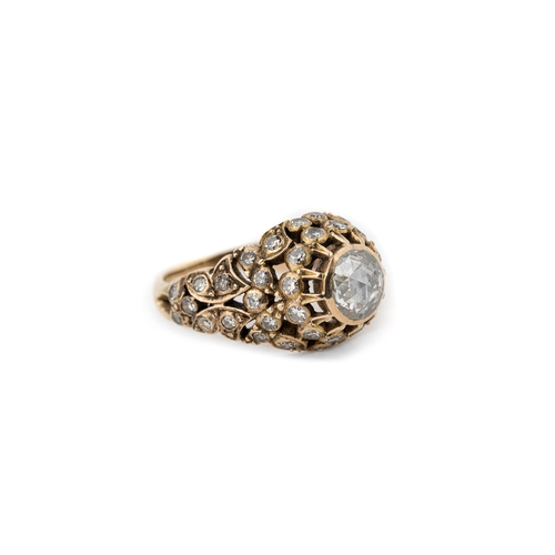 40 - Diamond and Gold Ottoman Ring   

An Ottoman diamond ring, a central round rose-cut 8.2mm diameter, ... 