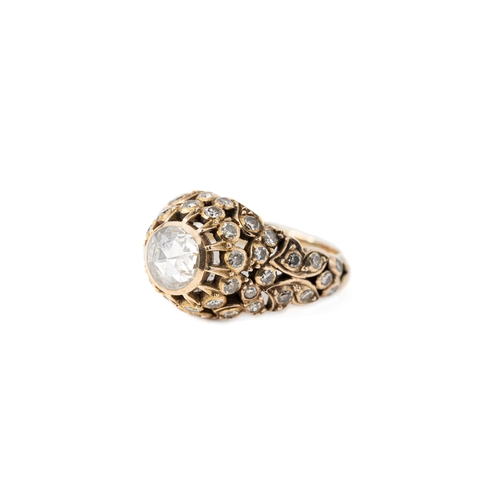 40 - Diamond and Gold Ottoman Ring   

An Ottoman diamond ring, a central round rose-cut 8.2mm diameter, ... 