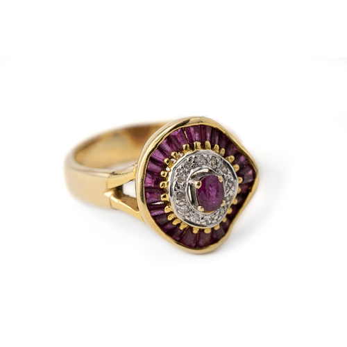 42 - A Diamond and Ruby Ring  

A diamond and ruby ring with an oval-shaped ruby gemstone, secured with c... 