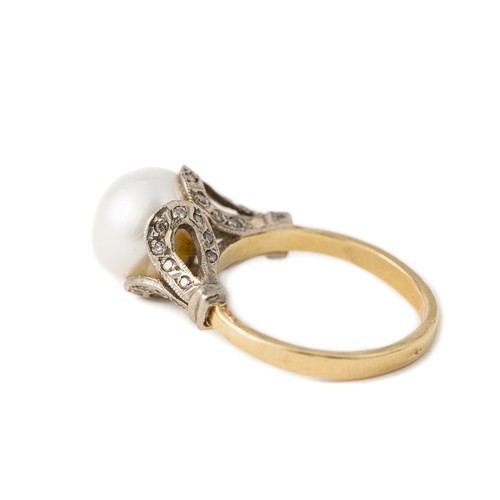 43 - Cultured South Sea Pearl and Diamond Ring  

A cultured pearl ring, single white cultured pearl in g... 