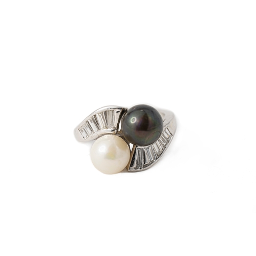 44 - Black and White Pearl and Diamond Platinum Ring   

A pearl and diamond ring, featuring a white and ... 