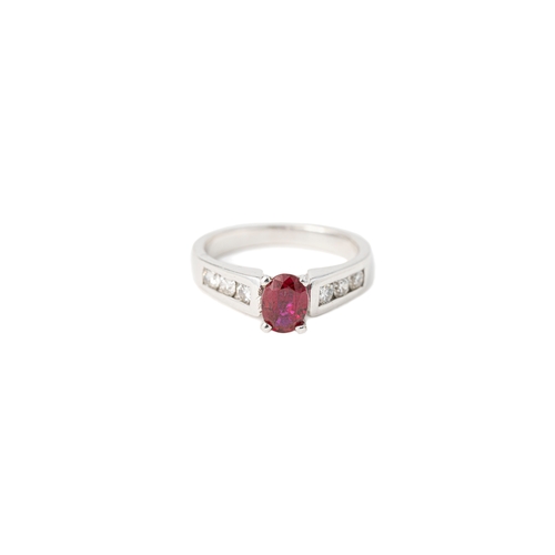 A Ruby and Diamond Gold Ring   

A diamond and ruby ring, a square-cut ruby to centre, secured with claws, further adorned by three round diamonds at both sides on the shoulders, 0.40ct ttw diamonds, Size 6.5 US, Size N UK, 14K white gold, 4.9 grams