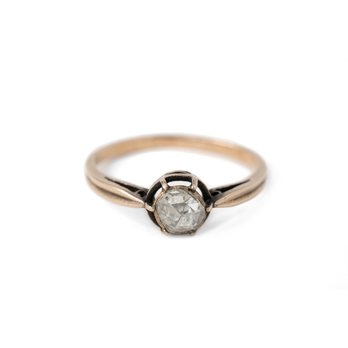 47 - A Gold and Diamond Ring  

A diamond ring, with a rose-cut 7mm diameter elevated and secured with cl... 