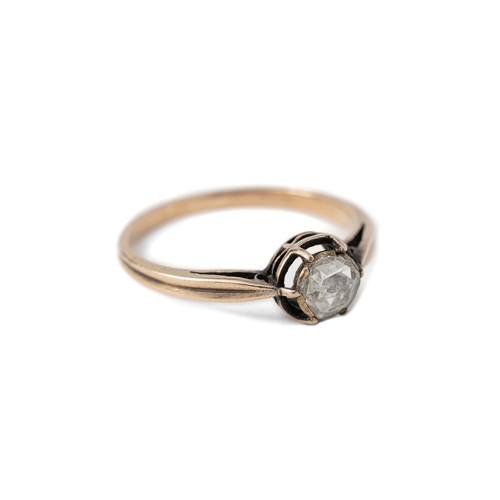 47 - A Gold and Diamond Ring  

A diamond ring, with a rose-cut 7mm diameter elevated and secured with cl... 