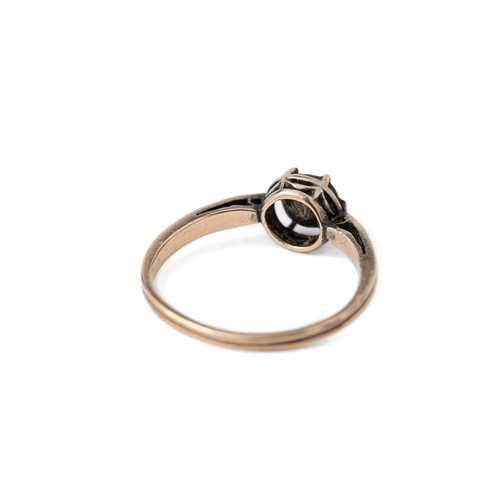 47 - A Gold and Diamond Ring  

A diamond ring, with a rose-cut 7mm diameter elevated and secured with cl... 