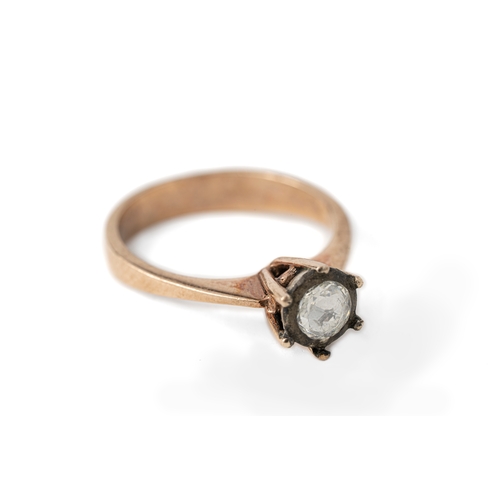 49 - A Gold and Diamond Ring  

A diamond ring with a round 5mm rose-cut diamond elevated and secured wit... 