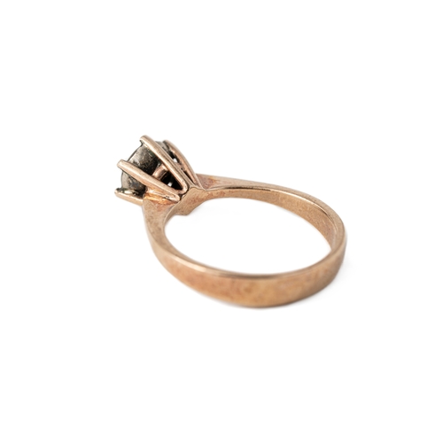 49 - A Gold and Diamond Ring  

A diamond ring with a round 5mm rose-cut diamond elevated and secured wit... 