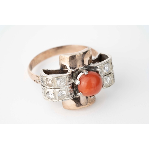 5 - A Coral and Diamond Ring   

A round coral stone to centre, within six claws, set with round diamond... 