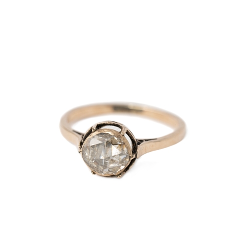 50 - A Diamond Gold Ring   

A diamond ring with a round 7.2mm rose-cut diamond elevated and secured with... 