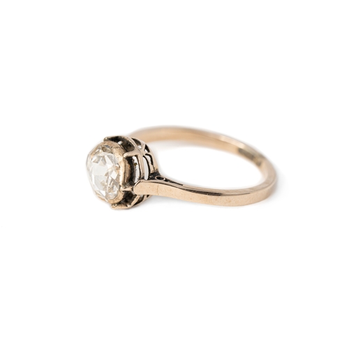 50 - A Diamond Gold Ring   

A diamond ring with a round 7.2mm rose-cut diamond elevated and secured with... 