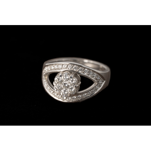 58 - An 18K Gold Diamond Ring

A diamond ring, with a flower shaped head formed of seven round diamonds, ... 