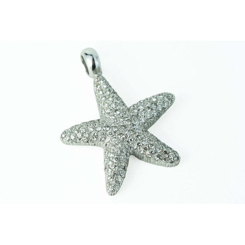 63 - White Gold Starfish Pendant With Diamonds 

The starfish pendant enhanced with beautiful round cut d... 