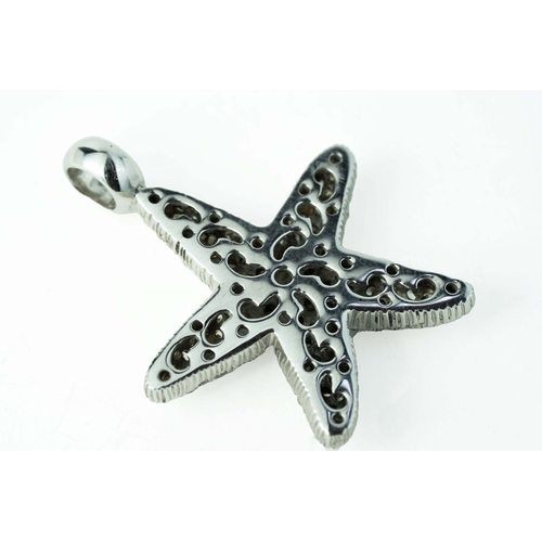 63 - White Gold Starfish Pendant With Diamonds 

The starfish pendant enhanced with beautiful round cut d... 