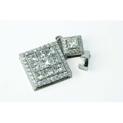 64 - Diamond-Shaped Diamond Pendant    

Of diamond shape, set in a square collet with princess-cut diamo... 