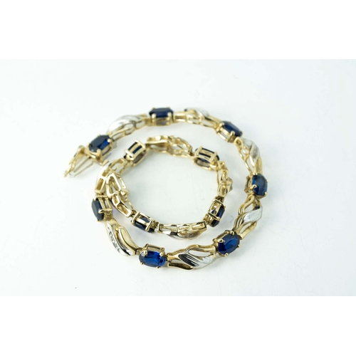 66 - Oval Sapphire And Diamond Gold Tennis Bracelet

The bracelet composed of eleven sapphires, all stone... 