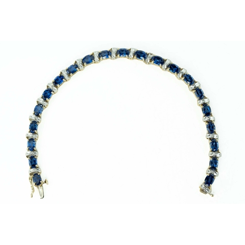 67 - Oval Sapphire And Diamond Gold Tennis Bracelet

The bracelet composed of oval sapphires and round di... 