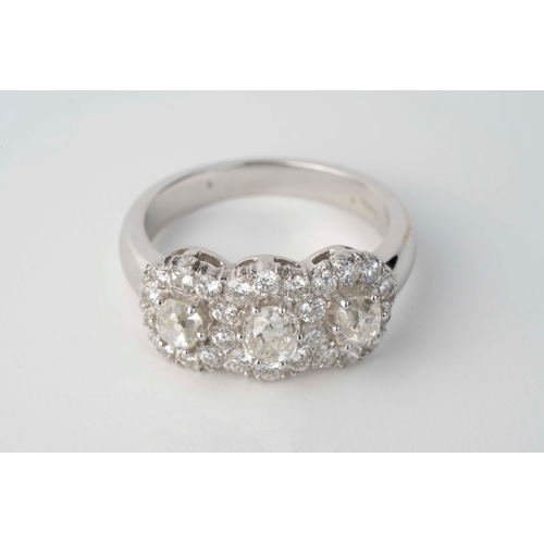 7 - Old Cut Diamond Ring, 19th Century or Earlier   

A white gold ring with three centre diamonds surro... 