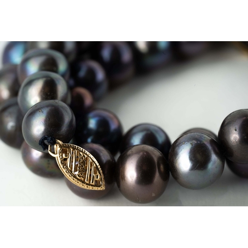 73 - Black cultured pearl necklace

Consisting of 45, 9-10mm diameter round pearls, a black cultured pear... 