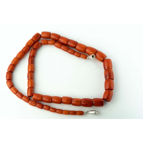 84 - Red Coral Necklace 

Consisting of 51 corals, of oval shape, with metal screw clip, 42cm long, 33.3 ... 