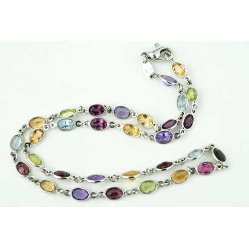 88 - White Gold And Multi-Coloured Gemstones Necklace 

A multi-coloured gemstone necklace in 18K white g... 