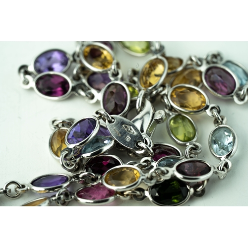 88 - White Gold And Multi-Coloured Gemstones Necklace 

A multi-coloured gemstone necklace in 18K white g... 