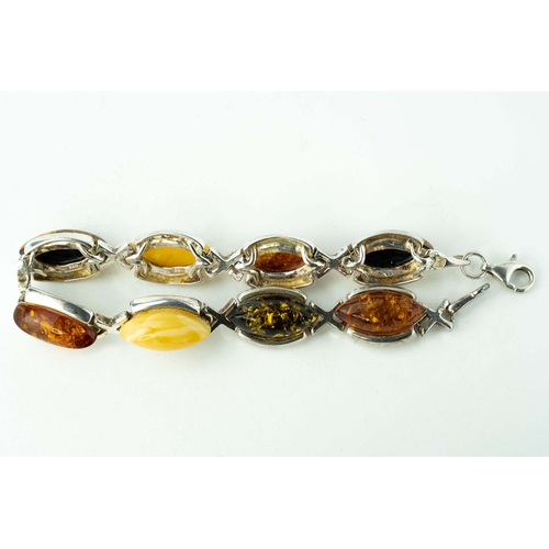 89 - Silver And Amber Bracelet

A bracelet crafted from silver, adorned with a collection of eight amber ... 