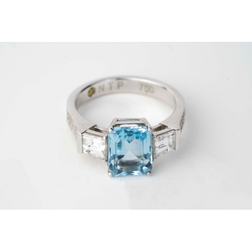 9 - Diamond and Aqua Marine  White Gold  Ring   

An aquamarine and diamond ring, the emerald cut aquama... 