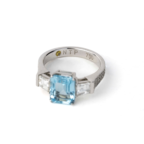 9 - Diamond and Aqua Marine  White Gold  Ring   

An aquamarine and diamond ring, the emerald cut aquama... 