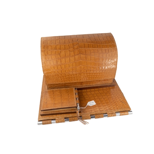 147 - Asprey  Camel Colour Crocodile Leather 3 Piece Desk Set  

A desk set comprising a letter holder wit... 