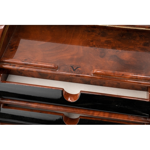 148 - Visconti Lacquer Pen Holder   

Featuring a slatted roll-down opening, this lacquer pen case elegant... 